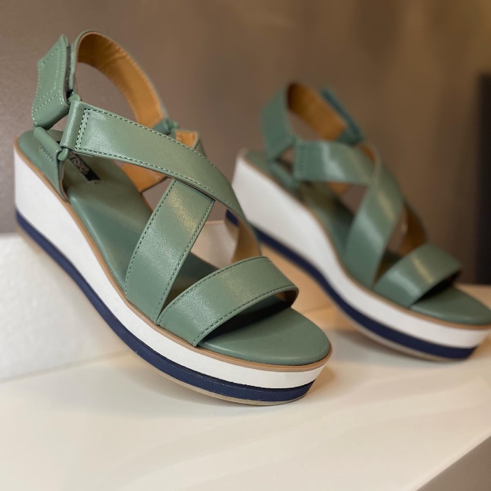 Stay comfortable while looking super cute in these sage green wedges by Kensie